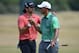 GULLANE, SCOTLAND - JULY 14: Tiger Woods of the USA and Jason Day of Australia during a practise day for the 142nd Open Championship at Muirfield on July 14, 2013 in Gullane, Scotland. (Photo by David Cannon/Getty Images)