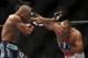Jun 15, 2013; Winnipeg, MB, Canada; Rashad Evans (left) fights Dan Henderson during their light heavyweight bout at UFC 161 at MTS Centre. Mandatory Credit: Tom Szczerbowski-USA TODAY Sports