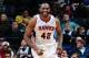 ATLANTA, GA - DECEMBER 20: Elton Brand #42 of the Atlanta Hawks smiles as he runs up the court against the Utah Jazz on December 20, 2013 at Philips Arena in Atlanta, Georgia. NOTE TO USER: User expressly acknowledges and agrees that, by downloading and