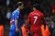 LIVERPOOL, ENGLAND - APRIL 21: Branislav Ivanovic of Chelsea talks with Luis Suarez of Liverpool as they walk in for half time during the Barclays Premier League match between Liverpool and Chelsea at Anfield on April 21, 2013 in Liverpool, England. (Ph