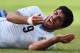 NATAL, BRAZIL - JUNE 24: Luis Suarez of Uruguay reacts during the 2014 FIFA World Cup Brazil Group D match between Italy and Uruguay at Estadio das Dunas on June 24, 2014 in Natal, Brazil. (Photo by Matthias Hangst/Getty Images)
