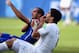 NATAL, BRAZIL - JUNE 24: Luis Suarez of Uruguay and Giorgio Chiellini of Italy react after a clash during the 2014 FIFA World Cup Brazil Group D match between Italy and Uruguay at Estadio das Dunas on June 24, 2014 in Natal, Brazil. (Photo by Matthias H