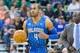 Mar 22, 2014; Salt Lake City, UT, USA; Orlando Magic guard Arron Afflalo (4) dribbles up the court during the first half against the Utah Jazz at EnergySolutions Arena. Mandatory Credit: Russ Isabella-USA TODAY Sports