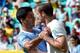 SALVADOR, BRAZIL - JUNE 30: Giorgio Chiellini of Italy clashes with Luis Suarez of Uruguay during the FIFA Confederations Cup Brazil 2013 3rd Place match between Uruguay and Italy at Estadio Octavio Mangabeira (Arena Fonte Nova Salvador) on June 30, 2013