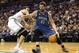 Dec 16, 2013; Boston, MA, USA; Minnesota Timberwolves power forward Kevin Love (42) drives past Boston Celtics power forward Kris Humphries (43) during the fourth quarter of Boston's 101-97 win at TD Garden. Mandatory Credit: Winslow Townson-USA TODAY Spo