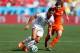 SAO PAULO, BRAZIL - JUNE 23: Alexis Sanchez of Chile controls the ball agains Daley Blind of the Netherlands during the 2014 FIFA World Cup Brazil Group B match between the Netherlands and Chile at Arena de Sao Paulo on June 23, 2014 in Sao Paulo, Brazil