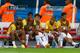 BRASILIA, BRAZIL - JUNE 23: (L-R) Maicon, Jo, Bernard, Neymar and Hulk of Brazil look on from the bench during the 2014 FIFA World Cup Brazil Group A match between Cameroon and Brazil at Estadio Nacional on June 23, 2014 in Brasilia, Brazil. (Photo by Ma