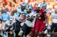 Aug 29, 2013; Columbia, SC, USA; North Carolina Tar Heels running back A.J. Blue (15) runs for yardage as South Carolina Gamecocks defensive end Darius English (5) pursues in the second quarter at Williams-Brice Stadium. Mandatory Credit: Jeff Blake-USA T