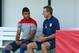 SAO PAULO, BRAZIL - JUNE 23: Head coach Jurgen Klinsmann of the the United States speaks with DeAndre Yedlin prior to training at Sao Paulo FC on June 23, 2014 in Sao Paulo, Brazil. (Photo by Kevin C. Cox/Getty Images)