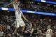 Mar 27, 2014; Anaheim, CA, USA; Arizona Wildcats forward Aaron Gordon (11) dunks the ball past San Diego State Aztecs forward Matt Shrigley (40) during the second half in the semifinals of the west regional of the 2014 NCAA Mens Basketball Championship to