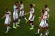 SALVADOR, BRAZIL - JUNE 16: Thomas Mueller of Germany (bottom R) celebrates with teammates after defeating Portugal 4-0 during the 2014 FIFA World Cup Brazil Group G match between Germany and Portugal at Arena Fonte Nova on June 16, 2014 in Salvador, Braz