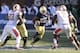Dec 28, 2013; Bronx, NY, USA; Notre Dame Fighting Irish running back Tarean Folston (25) runs the ball against the Rutgers Scarlet Knights during the first half of the Pinstripe Bowl at Yankees Stadium. Notre Dame Fighting Irish won the game 29-16. Mandat