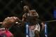 Apr 26, 2014; Baltimore, MD, USA; Anthony Johnson (right) strikes Phil Davis during their fight at Baltimore Arena. Johnson defeated Davis by judges decision. Mandatory Credit: Tommy Gilligan-USA TODAY Sports