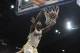Jan 18, 2014; Lawrence, KS, USA; Kansas Jayhawks center Joel Embiid (21) dunks the ball against Oklahoma State Cowboys guard Markel Brown (22) in the second half at Allen Fieldhouse. Kansas won 80-78. Mandatory Credit: John Rieger-USA TODAY Sports