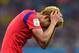 PORTO ALEGRE, BRAZIL - JUNE 22: A dejected Son Heung-Min of South Korea walks off the pitch afte a 4-2 defeat in the 2014 FIFA World Cup Brazil Group H match between South Korea and Algeria at Estadio Beira-Rio on June 22, 2014 in Porto Alegre, Brazil.