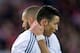 MADRID, SPAIN - MARCH 02: Karim Benzema (2ndR) embraces his teammate Cristiano Ronaldo (R) during the La Liga match between Club Atletico de Madrid and Real Madrid CF at Vicente Calderon Stadium on March 2, 2014 in Madrid, Spain. (Photo by Gonzalo Arroy