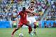 June 17, 2014; Fortazela, BRAZIL; Ghana player Asamoah Gyan and Germany player Mats Hummels battle for the ball during the 2014 World Cup at Estadio Castelao. Mandatory Credit: Tim Groothuis/Witters Sport via USA TODAY Sports