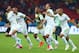 PORTO ALEGRE, BRAZIL - JUNE 22: Algeria celebrate after defeating South Korea 4-2 during the 2014 FIFA World Cup Brazil Group H match between South Korea and Algeria at Estadio Beira-Rio on June 22, 2014 in Porto Alegre, Brazil. (Photo by Jeff Gross/Get