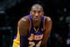 ATLANTA, GA - DECEMBER 16: Kobe Bryant #24 of the Los Angeles Lakers stands during a free throw against the Atlanta Hawks at Philips Arena on December 16, 2013 in Atlanta, Georgia. NOTE TO USER: User expressly acknowledges and agrees that, by downloadin