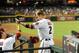 PHOENIX, AZ - SEPTEMBER 17: Aaron Hill #2 and teammate Martin Prado #14 of the Arizona Diamondbacks celebrates a home run against the Los Angeles Dodgers at Chase Field on September 17, 2013 in Phoenix, Arizona. (Photo by Norm Hall/Getty Images)
