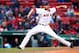 BOSTON, MA - APRIL 04: Andrew Miller #30 of the Boston Red Sox pitches against the Milwaukee Brewers during the Opening Day game at Fenway Park on April 4, 2014 in Boston, Massachusetts. (Photo by Jared Wickerham/Getty Images)