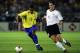 YOKOHAMA - JUNE 30: Kleberson of Brazil is watched by Miroslav Klose of Germany during the Germany v Brazil, World Cup Final match played at the International Stadium Yokohama in Yokohama, Japan on June 30, 2002. Brazil won 2-0. (Photo by Alex Livesey/Ge