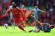 LIVERPOOL, ENGLAND - MAY 11: Luis Suarez of Liverpool evades Mathieu Debuchy of Newcastle United during the Barclays Premier League match between Liverpool and Newcastle United at Anfield on May 11, 2014 in Liverpool, England. (Photo by Laurence Griffit