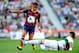 ELCHE, SPAIN - MAY 11: Alexis Sanchez of FC Barcelona competes for the ball Domingo Cisma of Elche FC during the La Liga match between Elche FC and FC Barcelona at Estadio Manuel Martinez Valero on May 11, 2014 in Elche, Spain. (Photo by David Ramos/Get