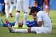 NATAL, BRAZIL - JUNE 24: Luis Suarez of Uruguay and Giorgio Chiellini of Italy react after a clash during the 2014 FIFA World Cup Brazil Group D match between Italy and Uruguay at Estadio das Dunas on June 24, 2014 in Natal, Brazil. (Photo by Matthias H