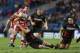 EDINBURGH, SCOTLAND - DECEMBER 08: Grant Gilchrist of Edinburgh tackles Freddie Burns of Gloucester during the The Heineken Cup Pool 6 Match between Edinburgh and Gloucester at Murrayfield Stadium, on December 08, 2013 in Edinburgh, Scotland. (Photo by I