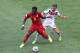 FORTALEZA, BRAZIL - JUNE 21: Sulley Muntari of Ghana and Mario Goetze of Germany compete for the ball during the 2014 FIFA World Cup Brazil Group G match between Germany and Ghana at Castelao on June 21, 2014 in Fortaleza, Brazil. (Photo by Jamie McDona