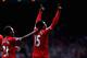 LIVERPOOL, ENGLAND - OCTOBER 05: Daniel Sturridge of Liverpool celebrates with Raheem Sterling after scoring the second goal during the Barclays Premier League match between Liverpool and Crystal Palace at Anfield on October 5, 2013 in Liverpool, England