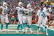 MIAMI GARDENS, FL - DECEMBER 15: Michael Thomas #31 of the Miami Dolphins celebrates a game clinching interception during a game against the New England Patriots at Sun Life Stadium on December 15, 2013 in Miami Gardens, Florida. (Photo by Mike Ehrmann/