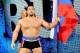 Rusev enters the arena with the Russian flag in hand.