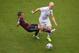 RECIFE, BRAZIL - JUNE 26: Philipp Lahm of Germany challenges Michael Bradley of the United States during the 2014 FIFA World Cup Brazil group G match between the United States and Germany at Arena Pernambuco on June 26, 2014 in Recife, Brazil. (Photo by