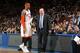 NEW YORK, NY - APRIL 12: Head coach Tom Thibodeau of the Chicago Bulls talks to Carmelo Anthony #7 of the New York Knicks during a game on April 12, 2011 at Madison Square Garden in New York City. NOTE TO USER: User expressly acknowledges and agrees th