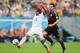RECIFE, BRAZIL - JUNE 26: Jermaine Jones of the United States controls the ball against Mats Hummels of Germany during the 2014 FIFA World Cup Brazil group G match between the United States and Germany at Arena Pernambuco on June 26, 2014 in Recife, Braz