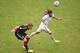 RECIFE, BRAZIL - JUNE 26: Kyle Beckerman of the United States and Bastian Schweinsteiger of Germany go for a header during the 2014 FIFA World Cup Brazil group G match between the United States and Germany at Arena Pernambuco on June 26, 2014 in Recife, B