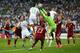 CURITIBA, BRAZIL - JUNE 26: Islam Slimani of Algeria scores his team's first goal on a header past Igor Akinfeev of Russia during the 2014 FIFA World Cup Brazil Group H match between Algeria and Russia at Arena da Baixada on June 26, 2014 in Curitiba, Br