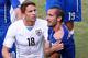 NATAL, BRAZIL - JUNE 24: Giorgio Chiellini of Italy pulls down his shirt after a clash with Luis Suarez of Uruguay (not pictured) as Gaston Ramirez of Uruguay looks on during the 2014 FIFA World Cup Brazil Group D match between Italy and Uruguay at Estad
