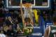 Mar 20, 2014; Oakland, CA, USA; Milwaukee Bucks guard Giannis Antetokounmpo (34) dunks the ball against the Golden State Warriors during the third quarter at Oracle Arena. The Golden State Warriors defeated the Milwaukee Bucks 115-110. Mandatory Credit: K