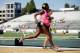 SACRAMENTO, CA - JUNE 26: A pregnant Alysia Montano runs in the opening round of the women's 800 meter run during day 2 of the USATF Outdoor Championships at Hornet Stadium on June 26, 2014 in Sacramento, California. (Photo by Ezra Shaw/Getty Images)