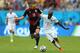 RECIFE, BRAZIL - JUNE 26: Toni Kroos of Germany challenges DaMarcus Beasley of the United States during the 2014 FIFA World Cup Brazil group G match between the United States and Germany at Arena Pernambuco on June 26, 2014 in Recife, Brazil. (Photo by