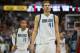 Mar 27, 2014; Dallas, TX, USA; Dallas Mavericks forward Dirk Nowitzki (41) and guard Monta Ellis (11) walk off the court during the second half against the Los Angeles Clippers at the American Airlines Center. The Clippers won 109-103. Mandatory Credit: J
