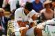 LONDON, ENGLAND - JUNE 27: Novak Djokovic of Serbia clutches his shoulder which he injured after a fall during his Gentlemen's Singles third round match against Gilles Simon of France on day five of the Wimbledon Lawn Tennis Championships at the All Engl