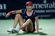 DUBAI, UNITED ARAB EMIRATES - FEBRUARY 21: Alize Cornet of France celebrates beating Serena Williams of the USA during the semi finals of the WTA Dubai Duty Free Tennis Championship at the Dubai Tennis Stadium on February 21, 2014 in Dubai, United Arab E