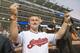 CLEVELAND, OH - JUNE 4: Rookie draft pick Johnny Manziel of the NFL Cleveland Browns acknowledges the crowd prior to the game between the Cleveland Indians and the Boston Red Sox along with other Brows rookies at Progressive Field on June 4, 2014 in Clev
