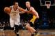 NEW YORK, NY - NOVEMBER 27: Shaun Livingston #14 of the Brooklyn Nets drives against Steve Blake #5 of the Los Angeles Lakers during the second half at Barclays Center on November 27, 2013 in the Brooklyn borough of New York City. The Lakers defeat the N