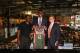MILWAUKEE, WI - JUNE 27: Head coach Larry Drew and general manager John Hammond of the Milwaukee Bucks introduce Jabari Parker, the 2nd pick in the 2014 NBA Draft, to media and fans during a press conference at the Milwaukee Public Market on June 27, 2014
