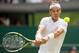 Jun 26, 2014; London, United Kingdom; Rafael Nadal (ESP) in action during his match against Lukas Rosol (CZE) on day four of the 2014 Wimbledon Championships at the All England Lawn and Tennis Club. Mandatory Credit: Susan Mullane-USA TODAY Sports